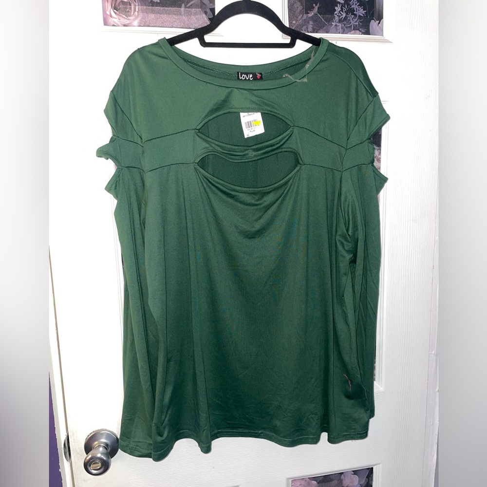 Long sleeve green cut out shirt.